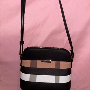 Elegant Black and Tan Crossbody Bag with Adjustable Strap